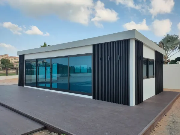 Glass garden rooms with sliding walls