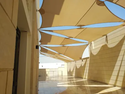 Tensile shade sails installed by Qala Aluminium