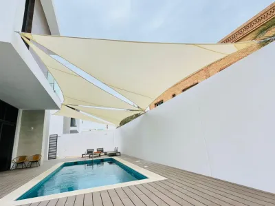 Tensile shade sails installed by Qala Aluminium