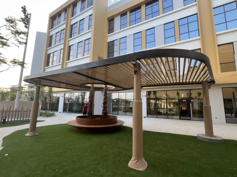 Courtyard pergolas around living trees